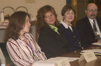 <span itemprop="name">Unidentified persons seated at a meeting of the...</span>