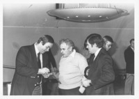 <span itemprop="name">Sam Wakshull (center) and two unidentified men...</span>