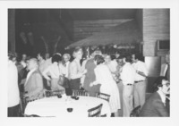 <span itemprop="name">A group of unidentified people socializing during...</span>