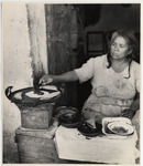 <span itemprop="name">A woman food-vendor selling tortillas....</span>