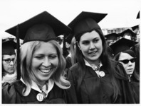<span itemprop="name">Two unidentified female graduating students...</span>