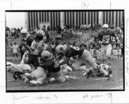 <span itemprop="name">A picture of football players in action as the...</span>