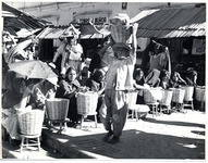 <span itemprop="name">A market scene with a boy holding a basket on his...</span>