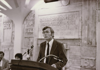 <span itemprop="name">An unidentified man speaking during an event...</span>