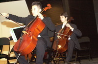 <span itemprop="name">Musicians in the string section rehearse for an...</span>