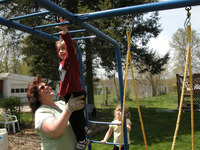 <span itemprop="name">Beth White guiding one of the children in her care...</span>