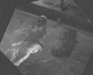 <span itemprop="name">An unidentified swimmer of the State University of...</span>