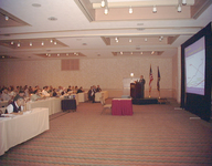 <span itemprop="name">An unidentified person addresses the audience at...</span>