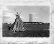 <span itemprop="name">A picture of a tepee associated with the State...</span>