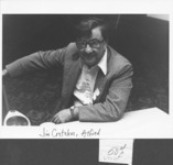 <span itemprop="name">Jim Cretekos seated at a table while attending an...</span>