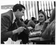<span itemprop="name">Unidentified students in the Campus Center...</span>