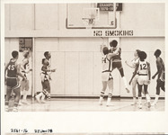 <span itemprop="name">A basketball player on Oneonta's team tries to...</span>