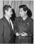 <span itemprop="name">Cesar Chavez with unidentified union official from...</span>