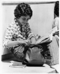 <span itemprop="name">An unidentified female sitting on the Academic...</span>