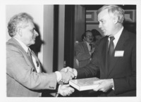 <span itemprop="name">Sam Wakshull (left) shaking hands with New York...</span>
