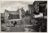 <span itemprop="name">A quiet market scene with stalls and people...</span>