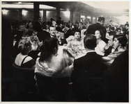 <span itemprop="name">A packed banquet hall scene of well dressed men...</span>