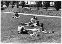 <span itemprop="name">Unidentified students on the lawn at the State...</span>