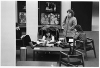 <span itemprop="name">Four unidentified students gathered around a table...</span>