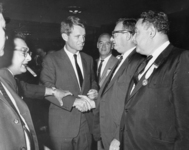 <span itemprop="name">Robert F. Kennedy shaking hands at a Textile...</span>