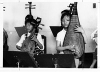 <span itemprop="name">A picture of children performing on stringed...</span>