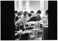 <span itemprop="name">A picture of students as they take notes during...</span>