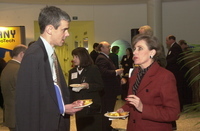 <span itemprop="name">David Gibson and an unidentified person converse...</span>
