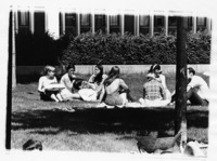 <span itemprop="name">A group of unidentified students sitting on the...</span>