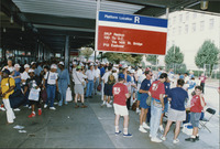 <span itemprop="name">Unidentified people in a bus or train station...</span>