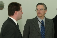 <span itemprop="name">Two unidentified men attend a press conference at...</span>