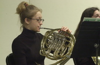 <span itemprop="name">A musician on the French Horn rehearses for an...</span>