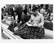 <span itemprop="name">A picture of spectators with blankets and hot...</span>