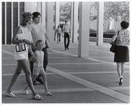 <span itemprop="name">Unidentified students and a young girl walking on...</span>
