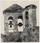 <span itemprop="name">Stone structure of two bells hung under arches....</span>