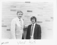 <span itemprop="name">Phil Reines (left) and an unidentified man...</span>