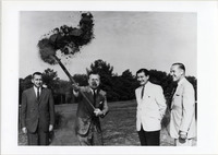 <span itemprop="name">Page 118: Gov. Nelson A. Rockefeller throws a shovelful of dirt on the Albany Country Club's 16th fairway to mark the ground-breaking of the new campus.</span>