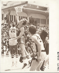 <span itemprop="name">A picture of a basketball game in progress between...</span>