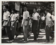 <span itemprop="name">Boys in white shirts, carrying notebooks, gather...</span>