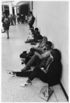 <span itemprop="name">Unidentified students sitting on the floor in a...</span>