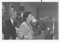 <span itemprop="name">An unidentified woman speaking during an event...</span>
