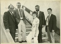 <span itemprop="name">John Crary (second from right) and unidentified...</span>
