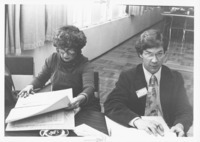 <span itemprop="name">Paul Doyle and an unidentified woman looking at...</span>