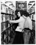 <span itemprop="name">Two unidentified students using the collection in...</span>
