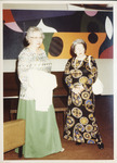 <span itemprop="name">Two unidentified women attending an event...</span>