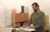 <span itemprop="name">M.F.A. student Chris Cassidy working on a piece of...</span>