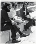 <span itemprop="name">Three unidentified students sitting on the...</span>