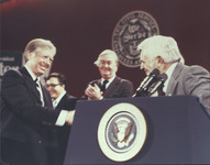 <span itemprop="name">President Jimmy Carter shakes hands with Civil...</span>