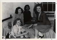 <span itemprop="name">Page 100 A-Top: Students in a Sayles Hall dorm room.</span>