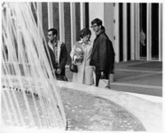 <span itemprop="name">Unidentified students standing by the fountain...</span>