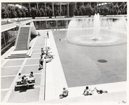 <span itemprop="name">Unidentified students relaxing by the fountain on...</span>